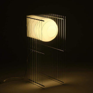 Lampe Bangoi-Banga - Lop - Grand Rectangulaire - Transparent éclairant un espace dans un fond sombre, produite par BANG. Idéale pour une ambiance chaleureuse.