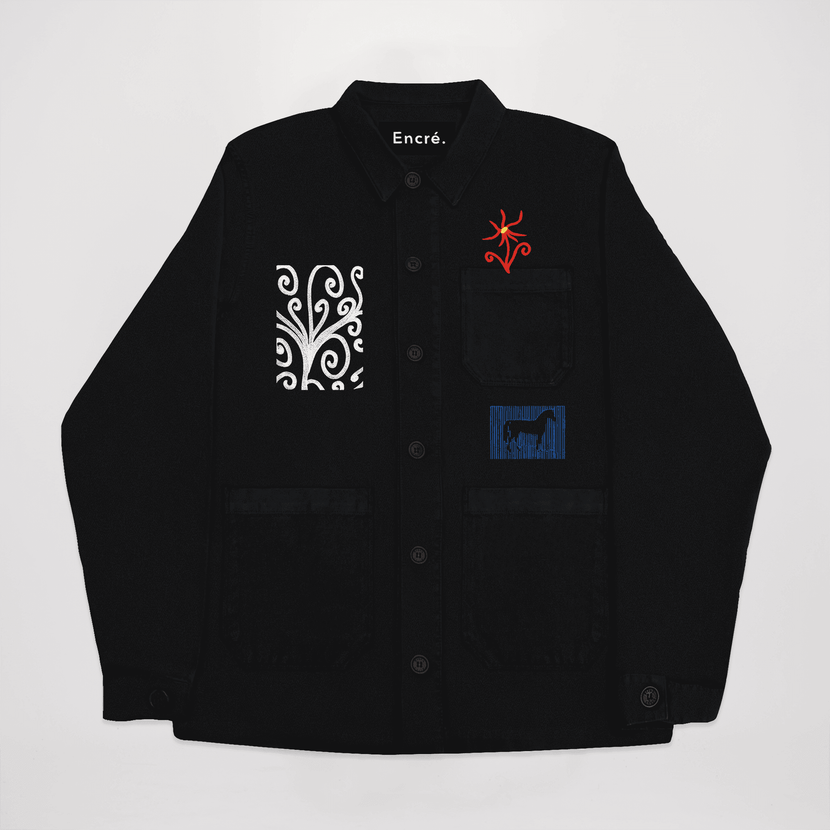 Chemise noire Encré avec motifs blancs et rouges, featuring des poches stylées, idéal pour un look décontracté.