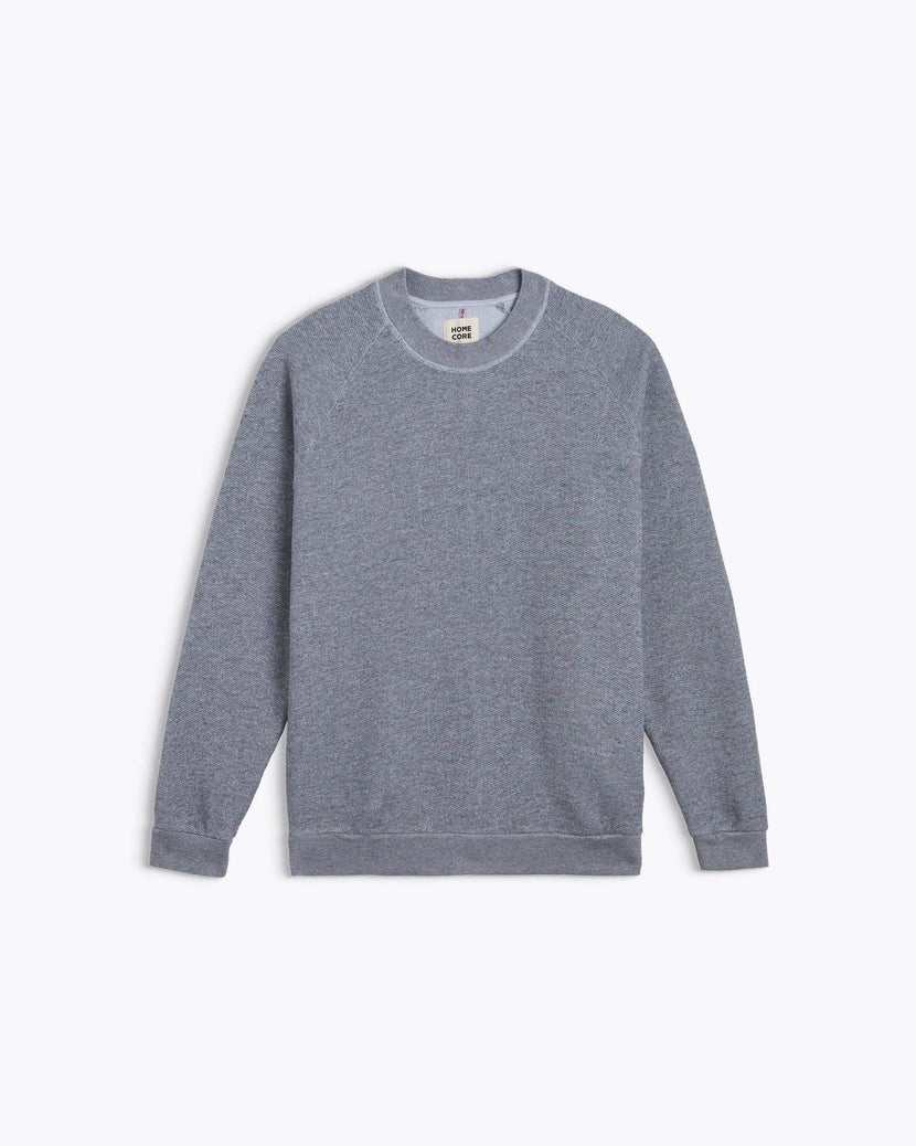 Pull Terry Sweat - Pastel Blue de Homecore, couleur bleu pastel, coupe droite avec col rond et manches raglan.