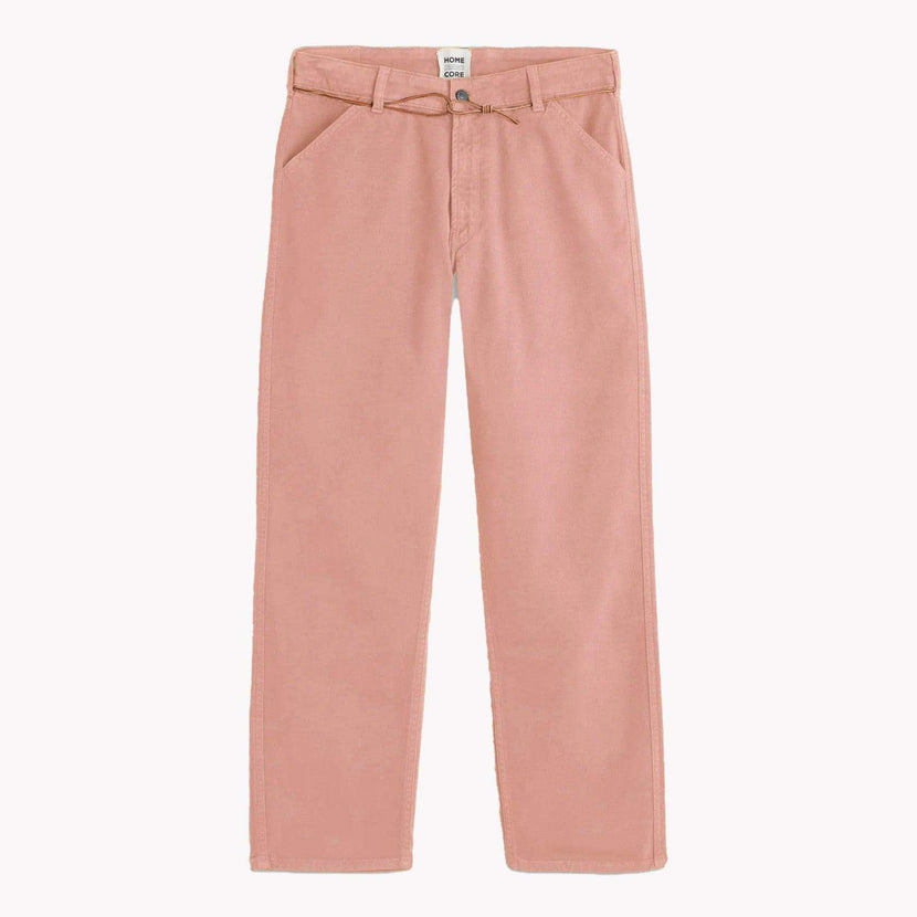 Pantalon Jabali Twill de Homecore en couleur saumon rose, affiché sur un fond blanc. Ce modèle fait partie de la collection SS25. Acheter maintenant pour un look tendance avec Homecore.